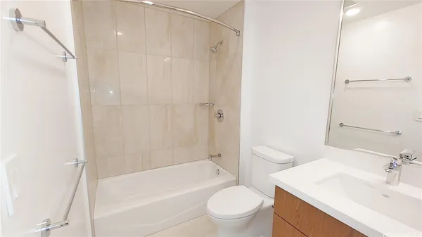 a bathroom with a sink a toilet and a bathtub