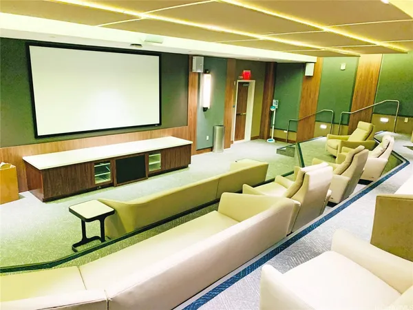 a lobby with furniture and window