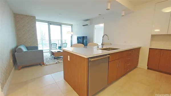 a view of kitchen with windows and cabinet