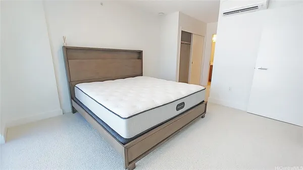 a room with a bed and bathroom