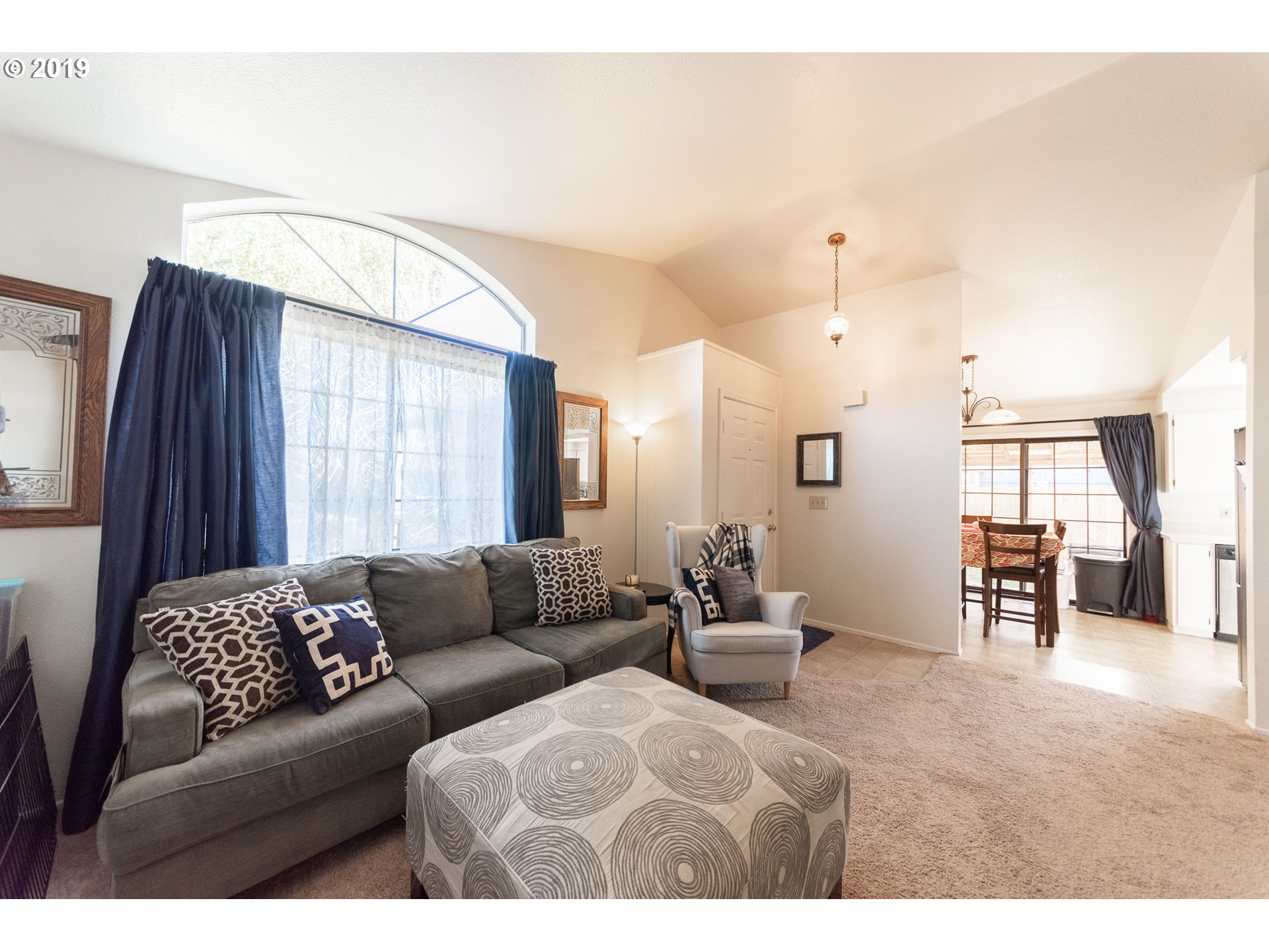 1298 8th Street Springfield, OR 97477 - Photo 7 of 25 a living room with furniture and a window