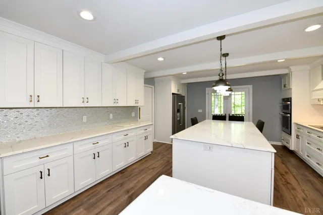 a large kitchen with cabinets