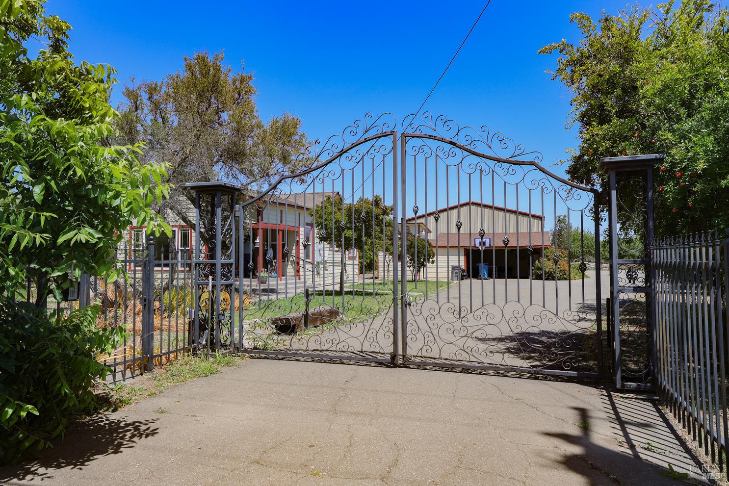 7948 North Meridian Road Dixon, CA 95620 - Photo 41 of 59 a view of a park with iron fence