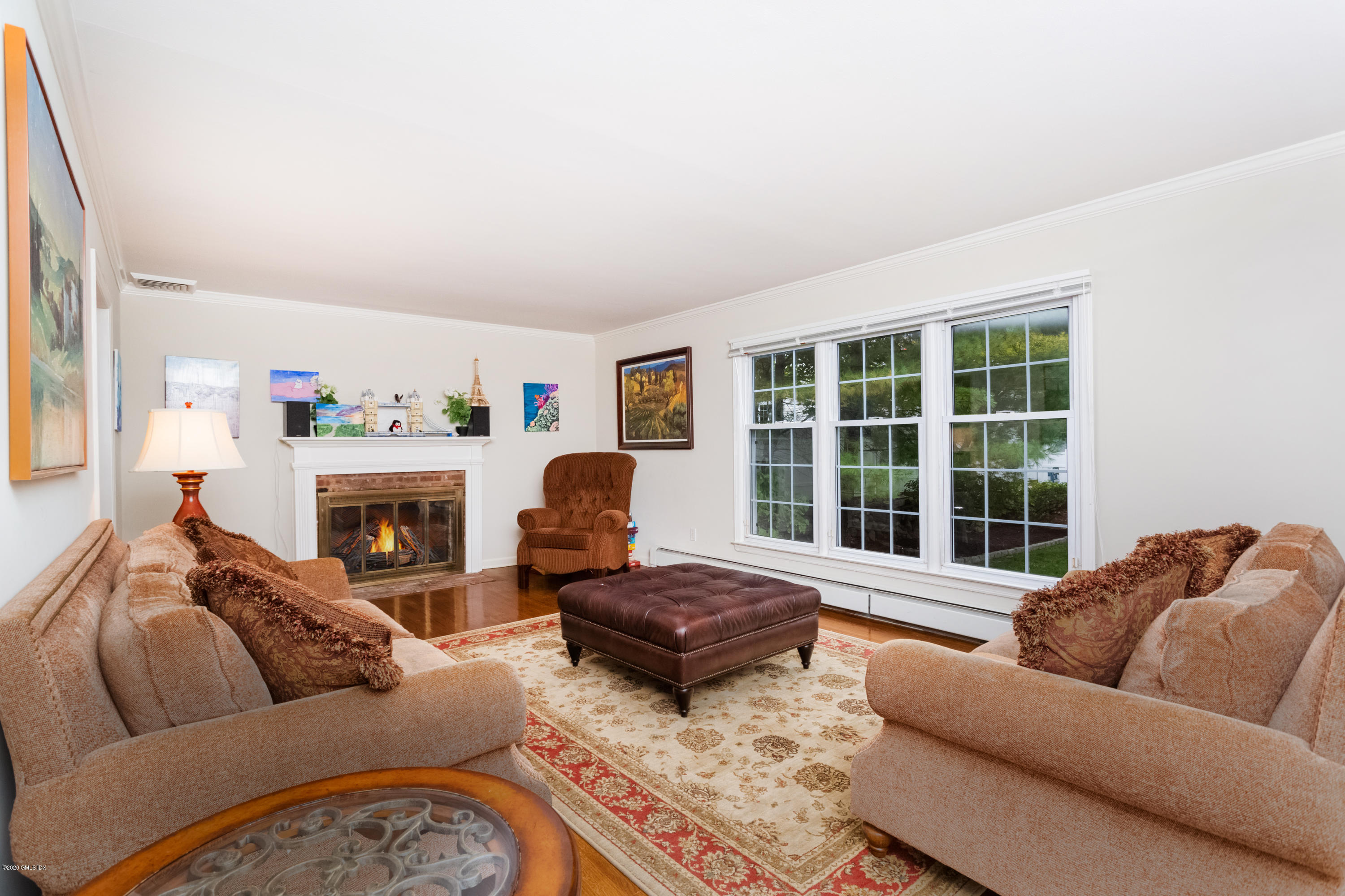 6 Sunshine Avenue Riverside, CT 06878 - Photo 4 of 28 a living room with furniture and a large window