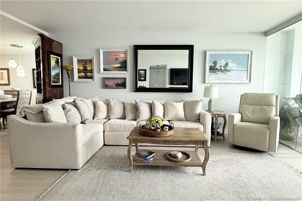 1950 Southwest Palm City Road, Unit 14101 Stuart, FL 34994 - Photo 15 of 36 a living room with furniture and a couch