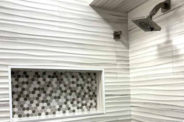 a view of a utility room with a sink