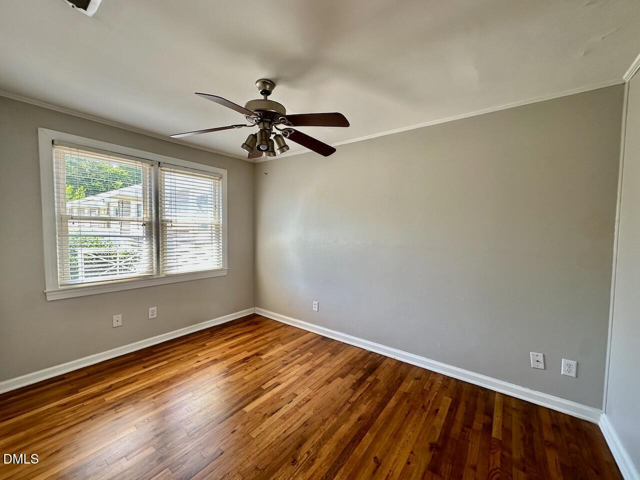 2333 Bernard Street Raleigh, NC 27608 - Photo 16 of 19 a view of empty room with wooden floor and fan