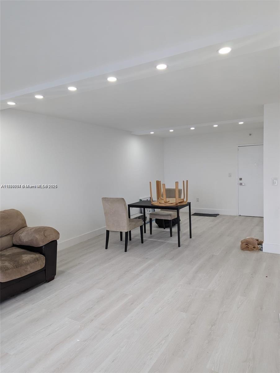 2801 Northeast 183rd Street, Unit 1709W Aventura, FL 33160 - Photo 5 of 6 a view of a big room with furniture and a couch