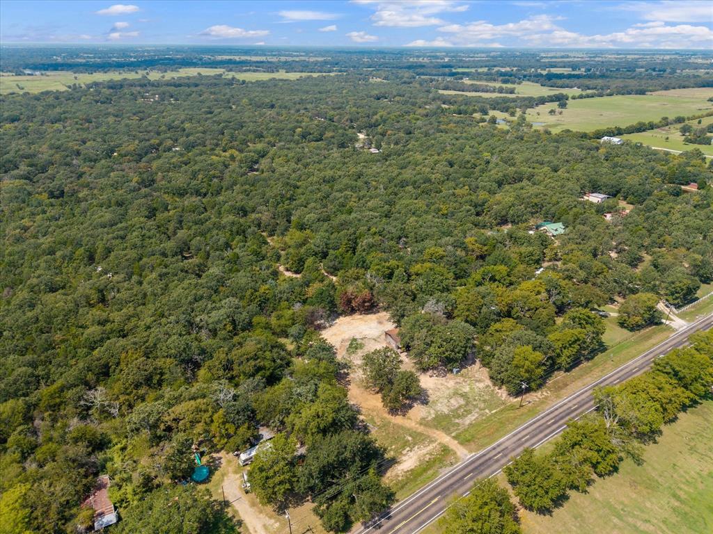 3166 Fm 316 Mabank, TX 75147 - Photo 14 of 22 a view of a lake with a mountain in the background