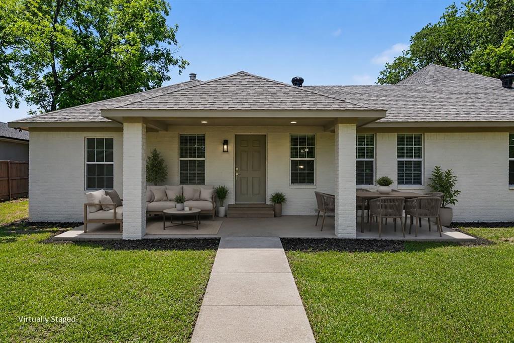 307 Dixon Street Terrell, TX 75160 - Photo 27 of 32 Single-story residence featuring a covered front porch, brick exterior, and a gabled roofline with asphalt shingles