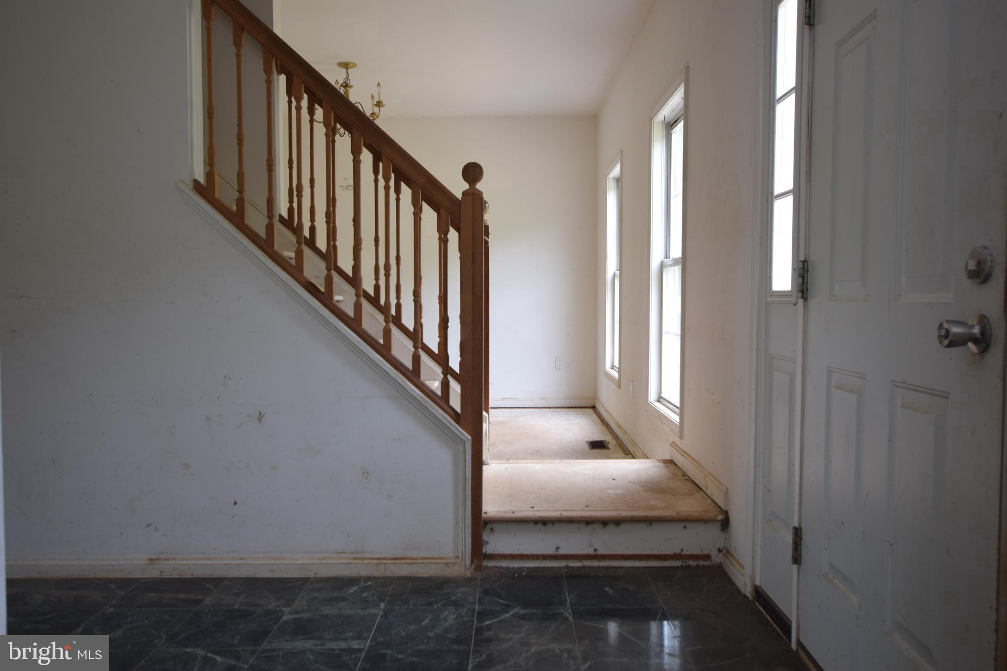 17301 Conoy Road Barnesville, MD 20838 - Photo 21 of 48 Foyer opens to Dining & Living Rooms