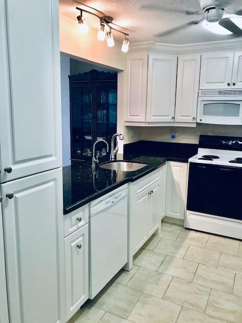 10777 West Sample Road, Unit 610 Coral Springs, FL 33065 - Photo 9 of 23 kitchen_open concept