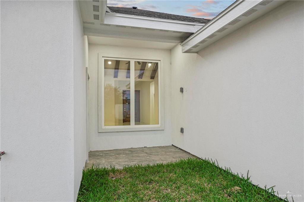 2732 East Conroe Road Edinburg, TX 78542 - Photo 14 of 15 a view of an empty room with a window