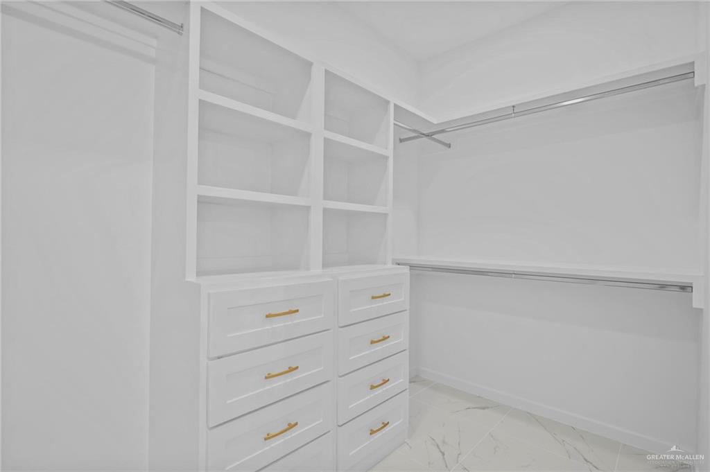 2732 East Conroe Road Edinburg, TX 78542 - Photo 9 of 15 a view of an empty walk in closet