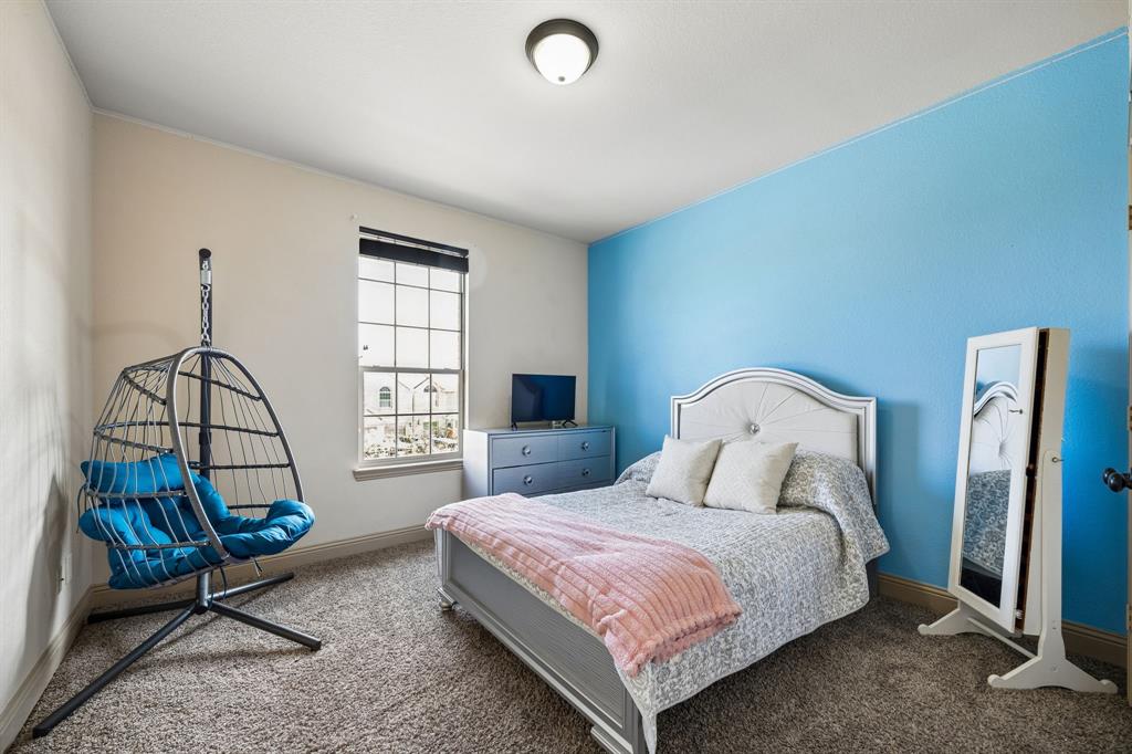 1341 Canary Lane Forney, TX 75126 - Photo 25 of 34 Secondary bedroom with Jaack and Jill bathroom