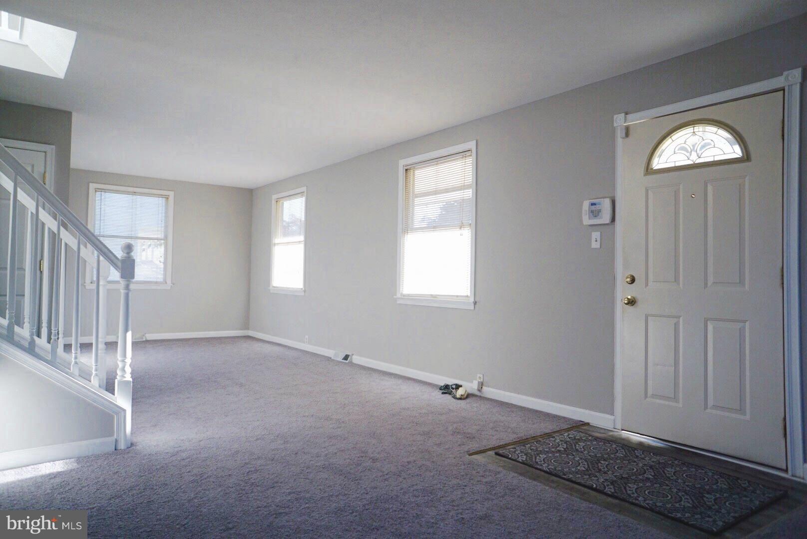 8244 Cornwall Road Baltimore, MD 21222 - Photo 2 of 30 a view of an empty room with closet and a window
