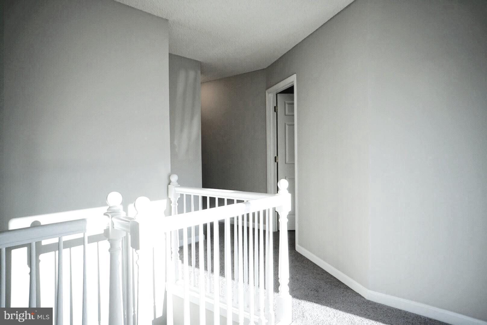 8244 Cornwall Road Baltimore, MD 21222 - Photo 13 of 30 a bedroom with a bed