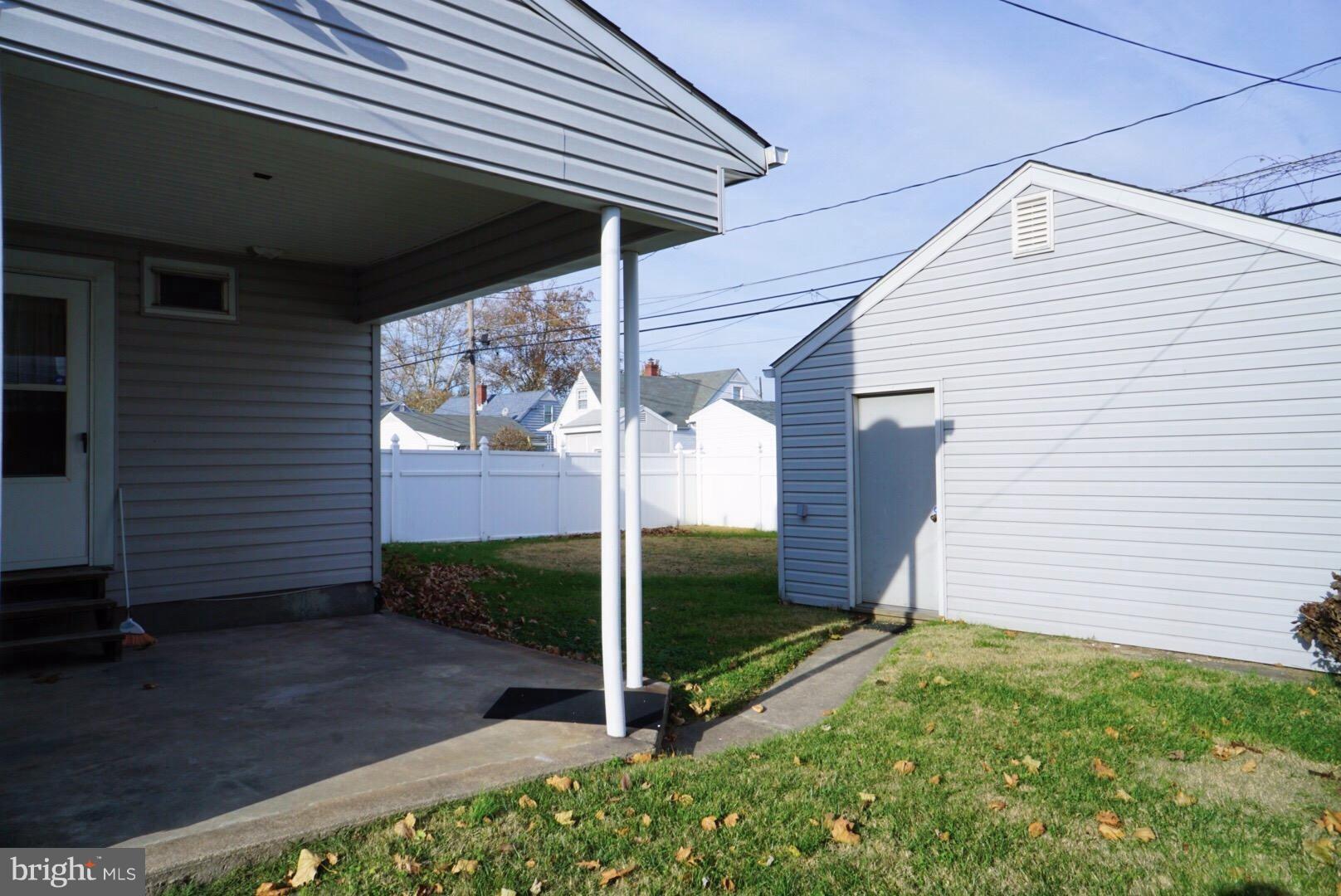 8244 Cornwall Road Baltimore, MD 21222 - Photo 23 of 30 a view of a backyard