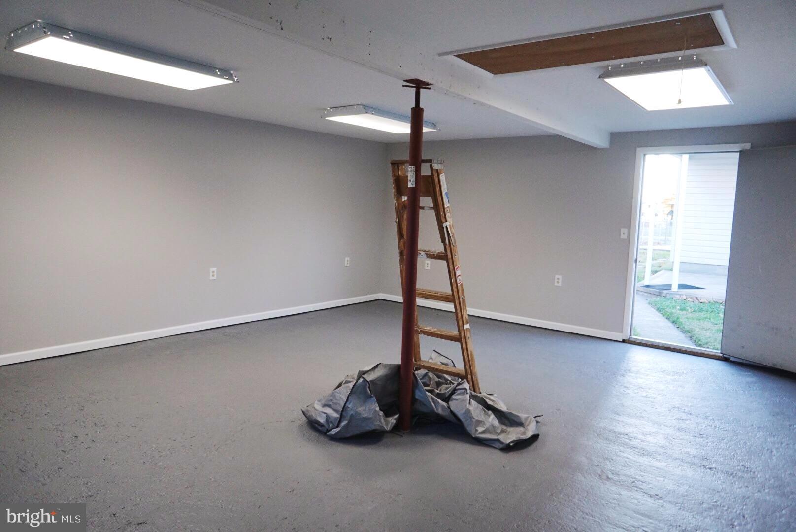 8244 Cornwall Road Baltimore, MD 21222 - Photo 26 of 30 a room with gym equipment
