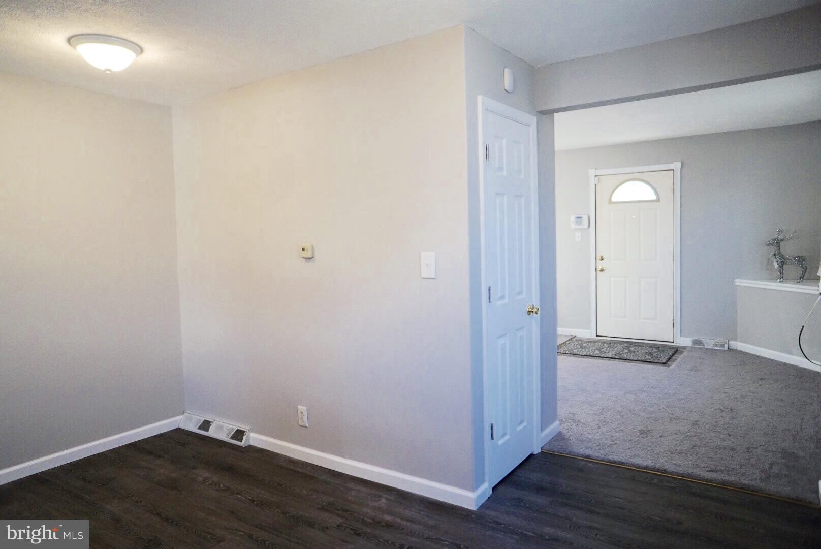 8244 Cornwall Road Baltimore, MD 21222 - Photo 8 of 30 wooden floor in an empty room