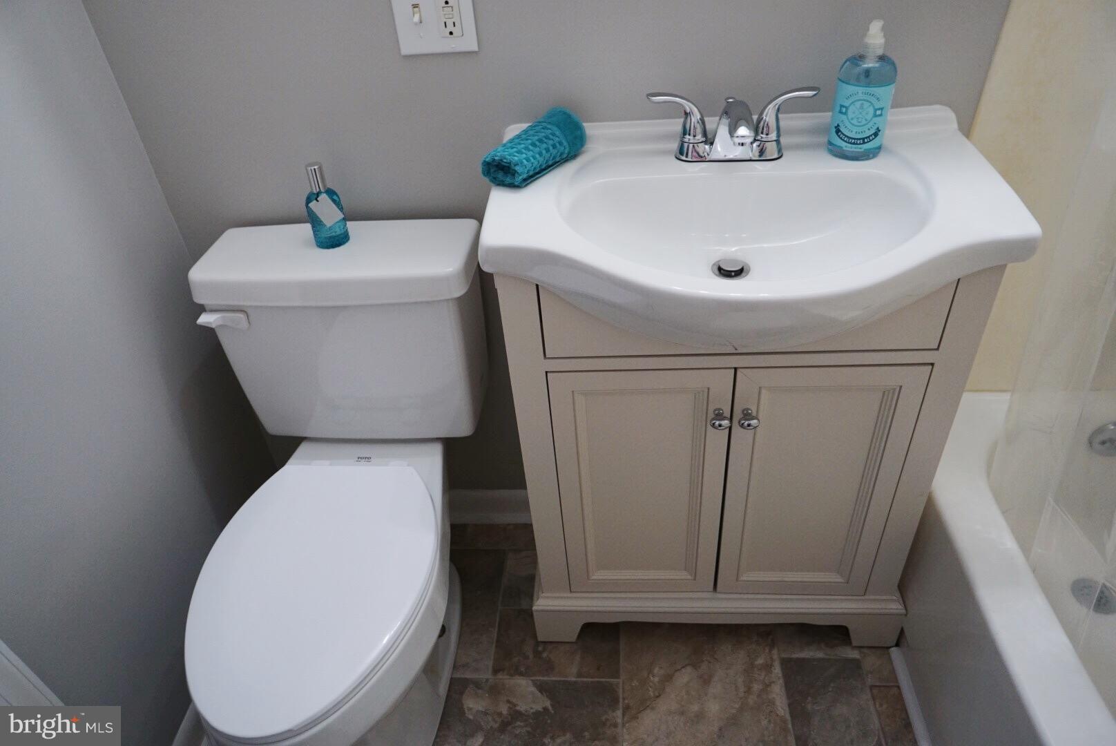 8244 Cornwall Road Baltimore, MD 21222 - Photo 10 of 30 a white toilet sitting next to a white sink