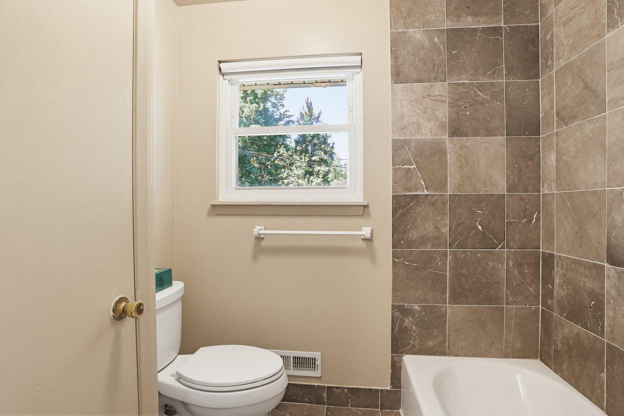 8145 Scotts Level Road Pikesville, MD 21208 - Photo 25 of 45 Bright and airy bathroom retreat.