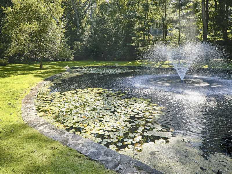 44 Glenville Road Greenwich, CT 06831 - Photo 25 of 25 a view of a lake with a yard