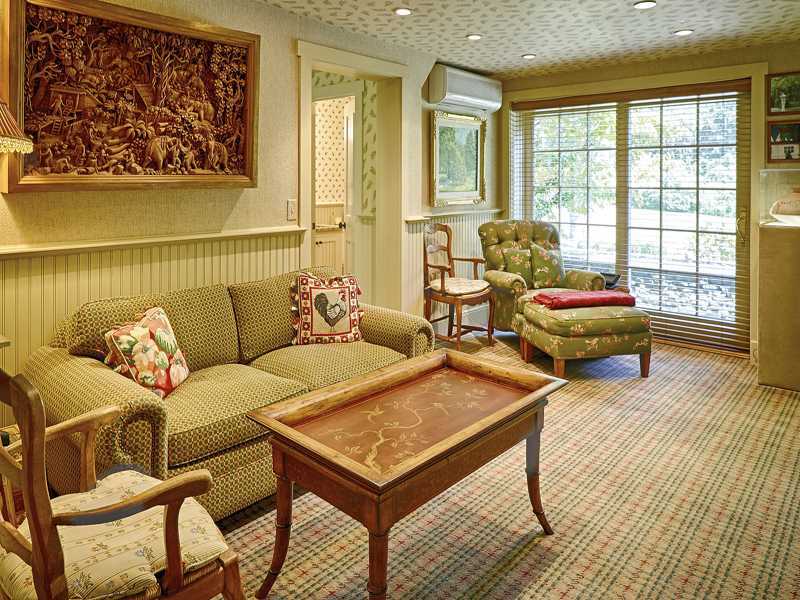 44 Glenville Road Greenwich, CT 06831 - Photo 10 of 25 a theatre with furniture and wooden floor