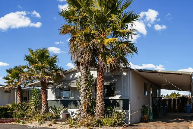 a bathroom with a sink tub shower and a mirror