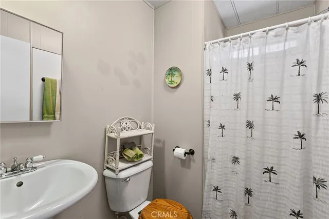 a view of a house with a yard and plants