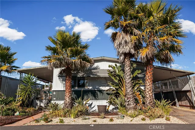 a view of a house with a street