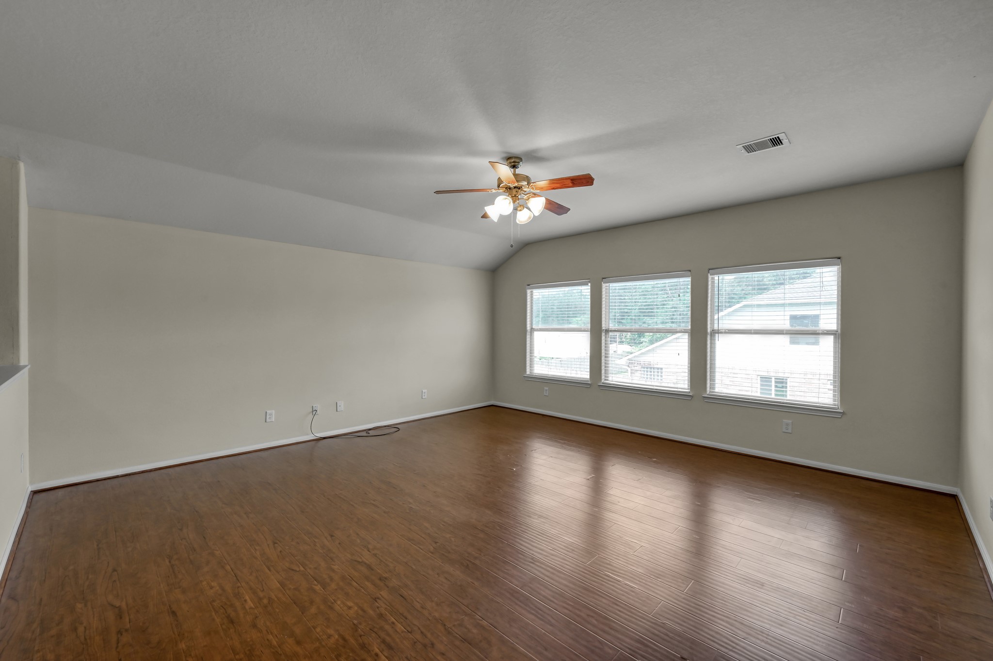 631 Timberstand Lane Spring, TX 77373 - Photo 32 of 38 Spacious game room perfect for entertaining, movie nights, or creating the flex space that fits your lifestyle.
