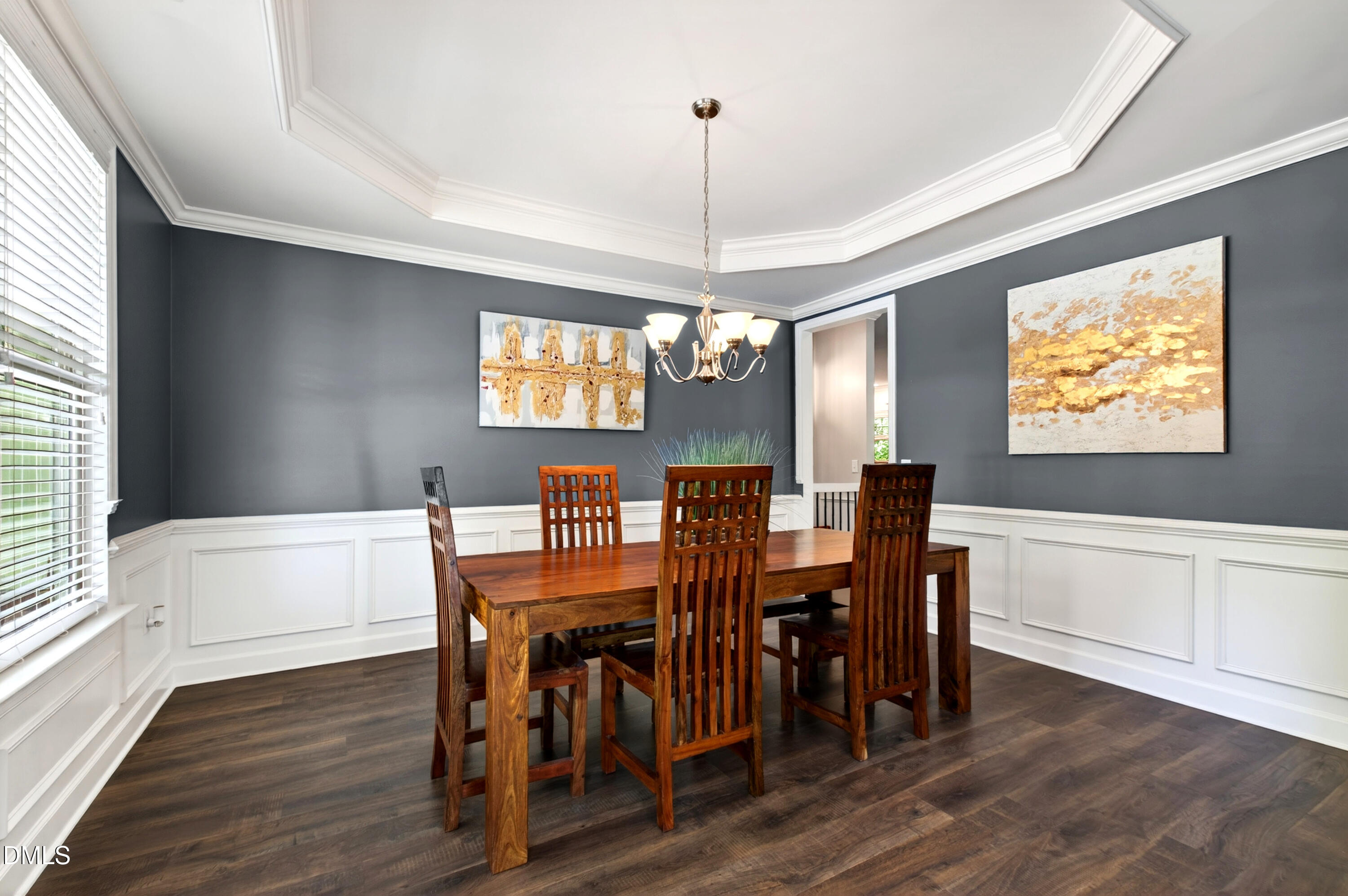 313 Karpen Lane Cary, NC 27519 - Photo 3 of 86 a view of a dining room with furniture window and wooden floor