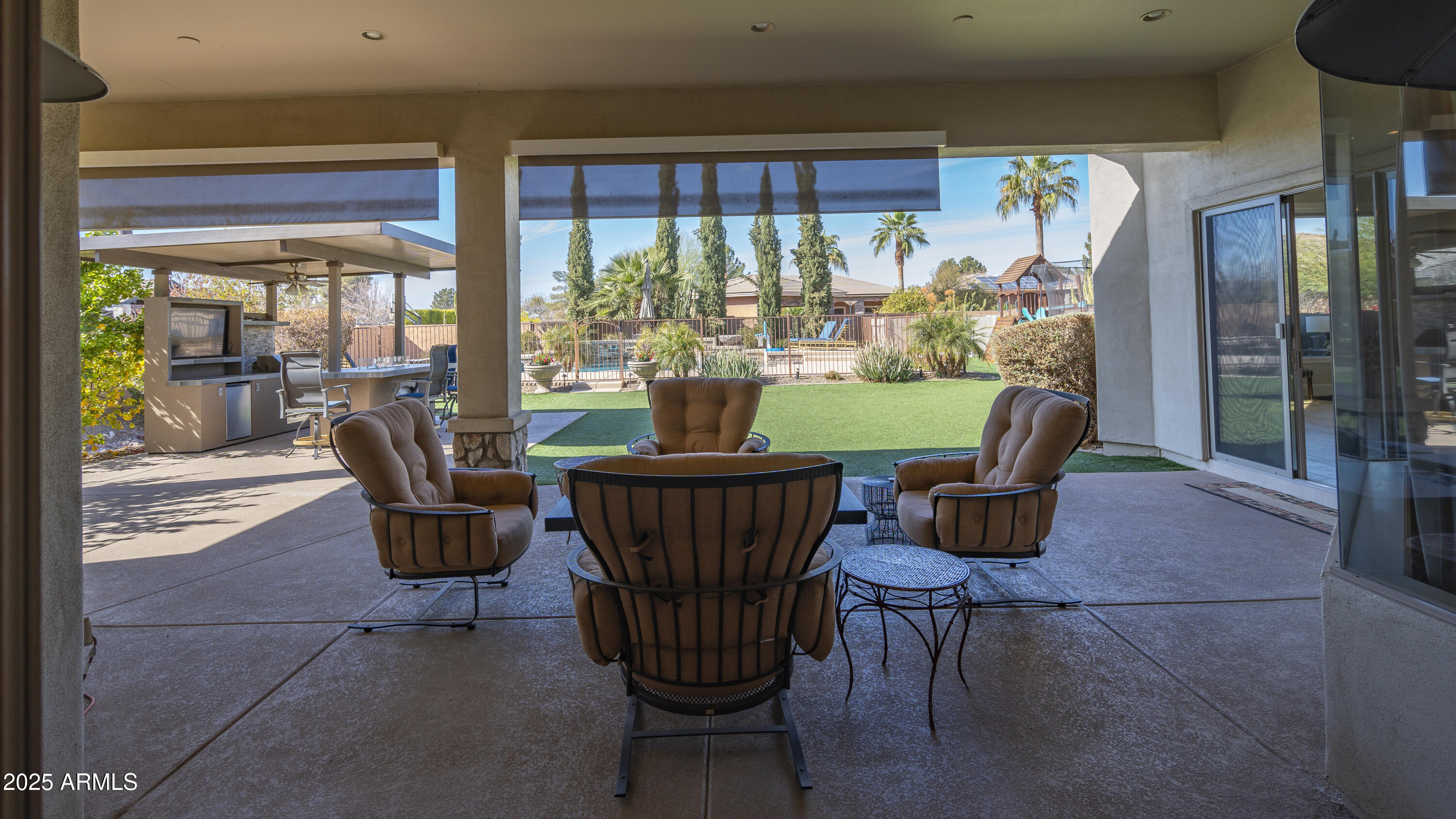 56 South Prairie Road Gilbert, AZ 85296 - Photo 36 of 59 a view of a dining room with furniture a chandelier and pool table