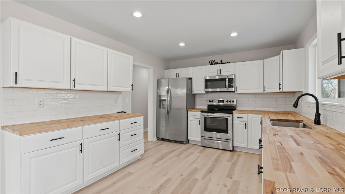 31851 Georgia Road Gravois Mills, MO 65037 - Photo 57 of 62 Lots of room to move about the kitchen