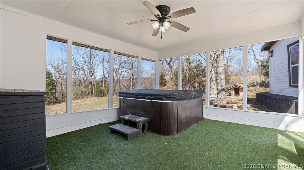 31851 Georgia Road Gravois Mills, MO 65037 - Photo 7 of 62 Screened porch with hot tub