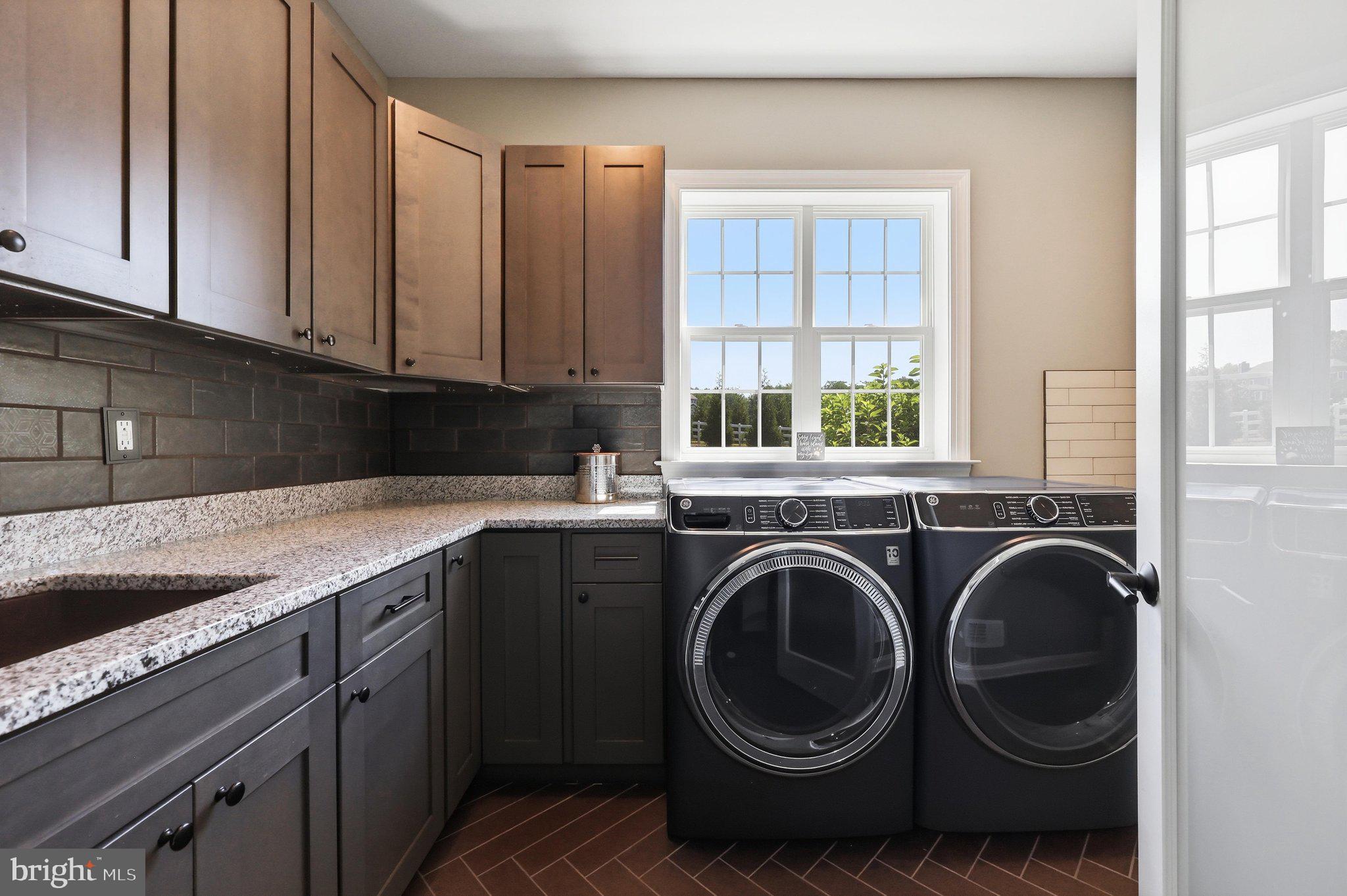 8225 Ball Road Frederick, MD 21704 - Photo 26 of 51 Laundry Room w/storage & a dog wash station
