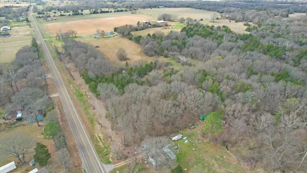 a view of a small yard from a balcony