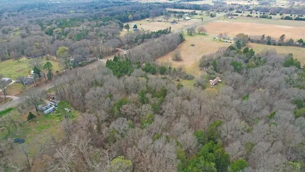 a view of a yard with an outdoor space