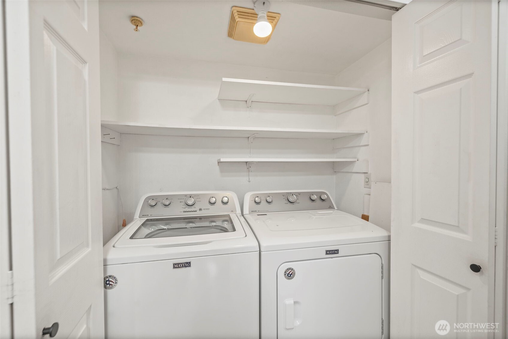 10824 Southeast 170th Street, Unit B103 Renton, WA 98055 - Photo 15 of 31 a utility room with dryer and washer