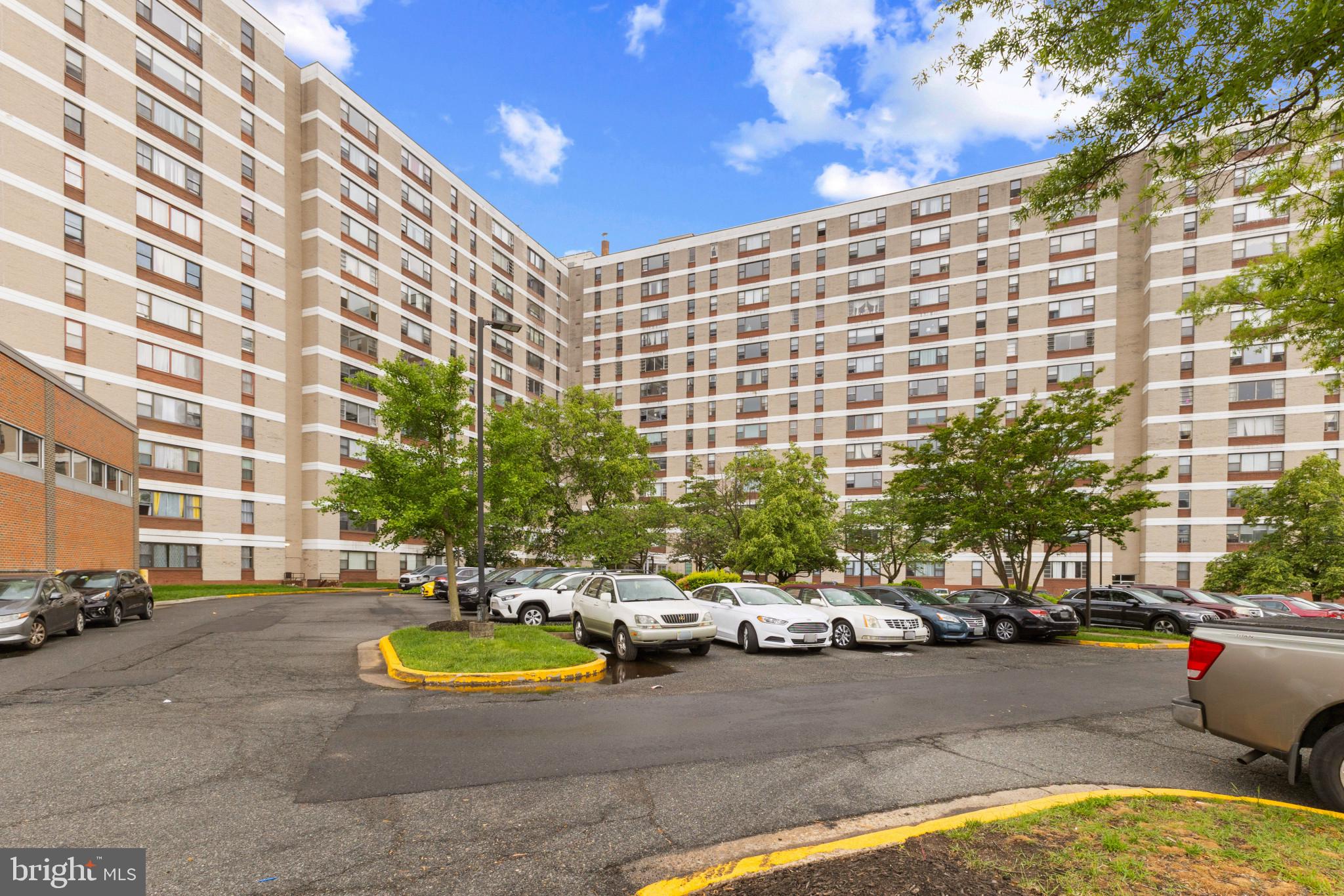 4600 Duke Street, Unit 613 Alexandria, VA 22304 - Photo 2 of 32 a view of a swimming pool and a patio