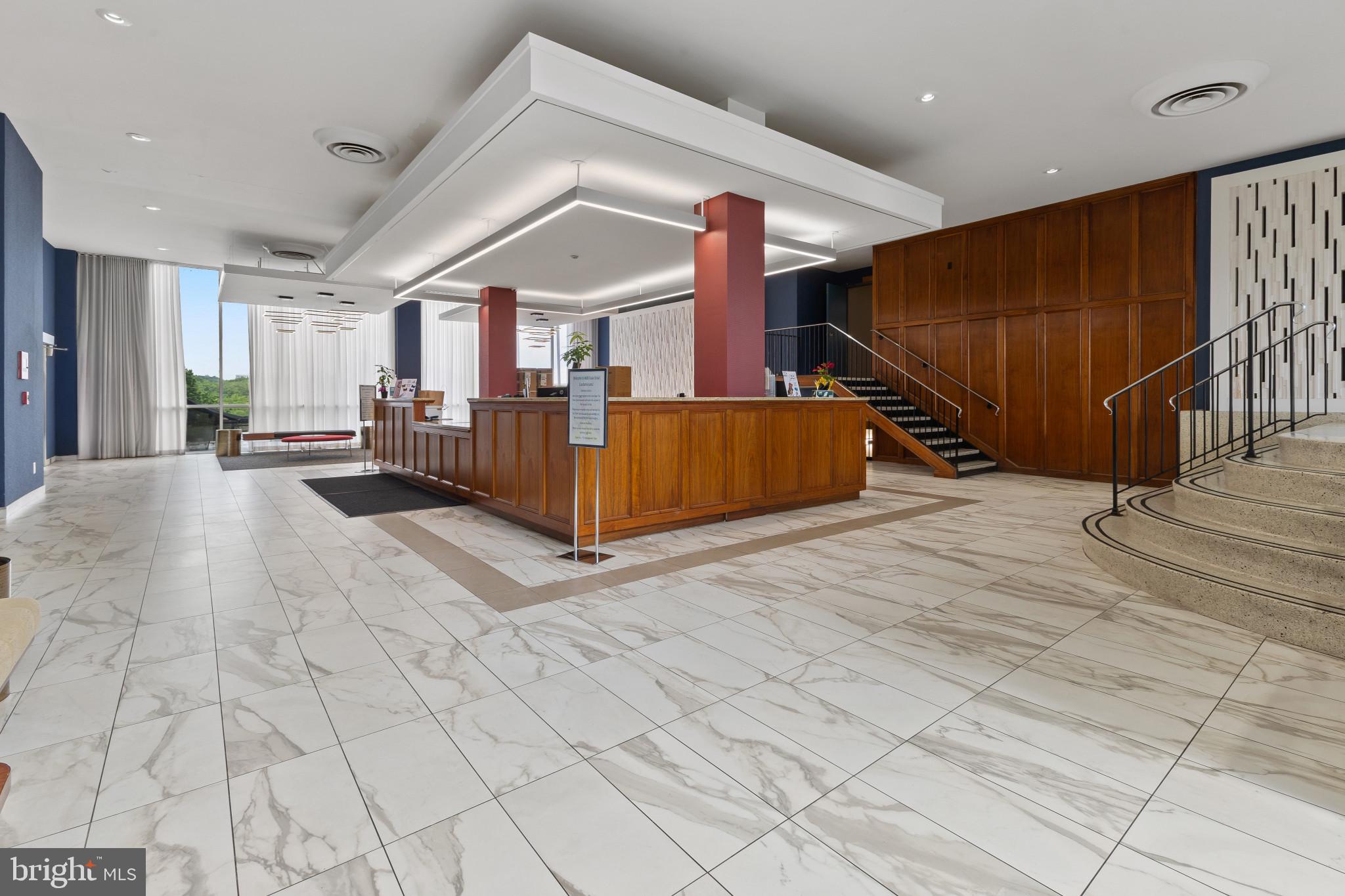4600 Duke Street, Unit 613 Alexandria, VA 22304 - Photo 4 of 32 a view of a livingroom with furniture and a couch
