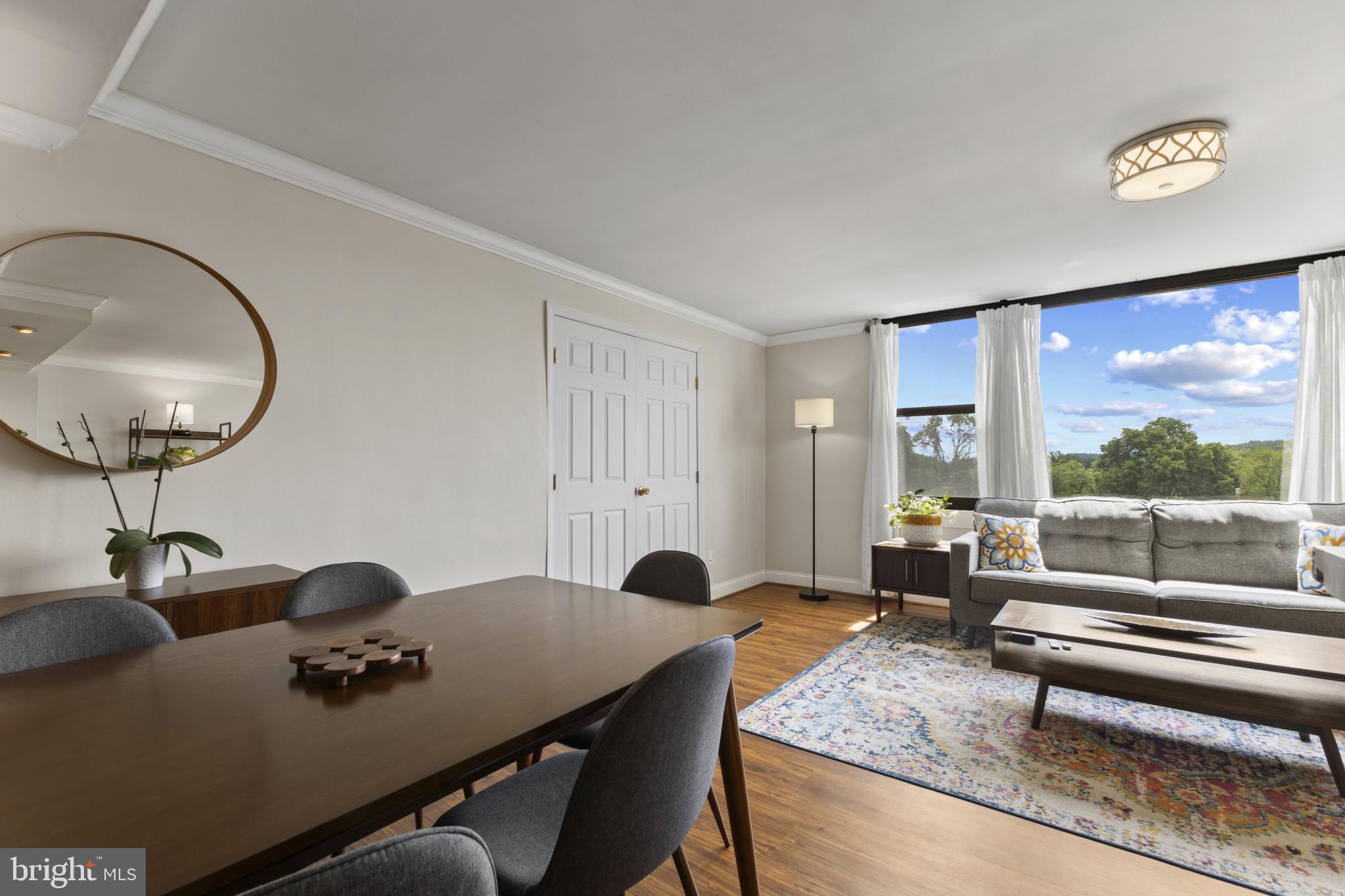 4600 Duke Street, Unit 613 Alexandria, VA 22304 - Photo 8 of 32 a workspace with furniture and window