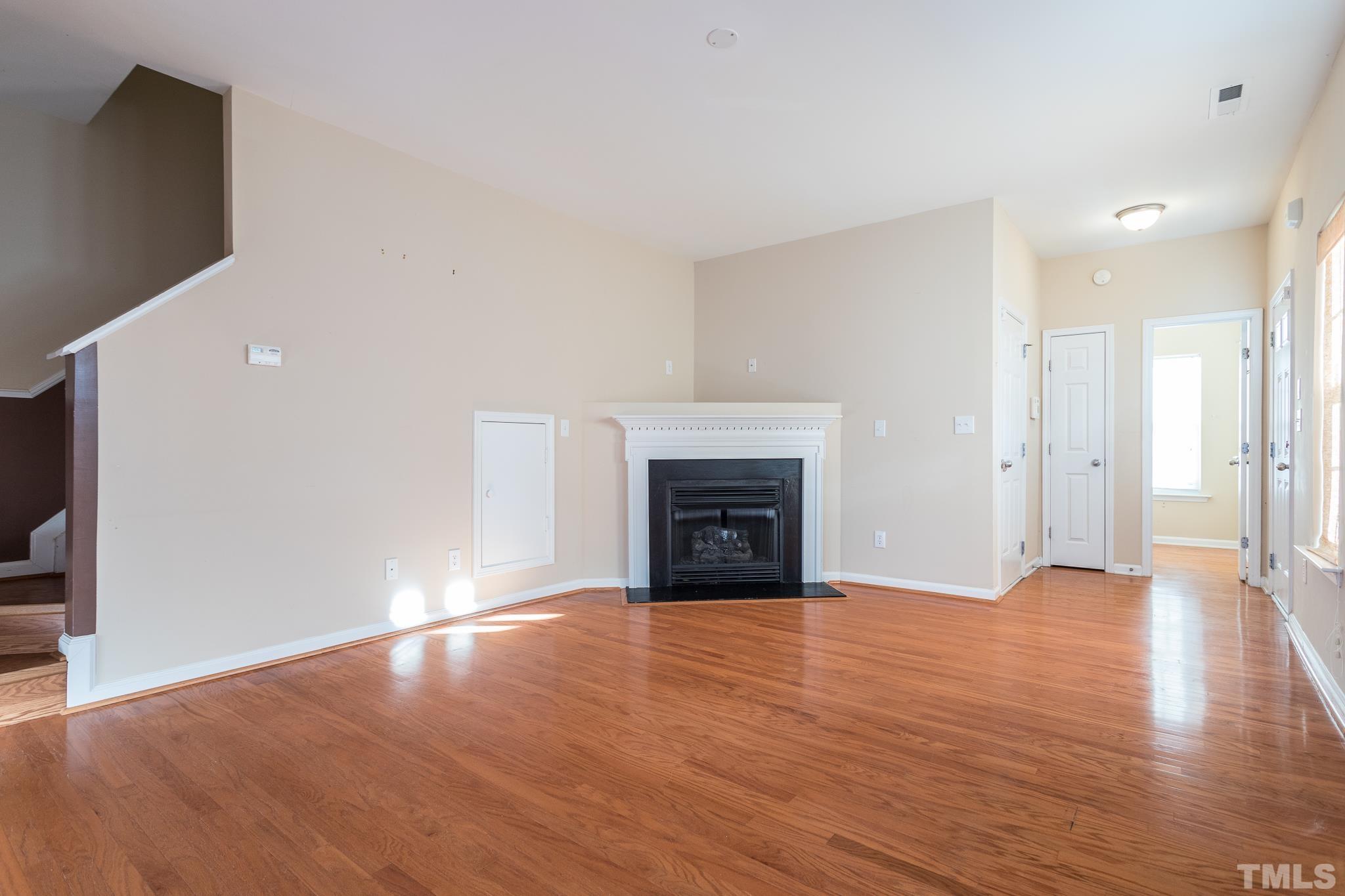 2153 Metacomet Way Raleigh, NC 27604 - Photo 6 of 30 a view of empty room with wooden floor