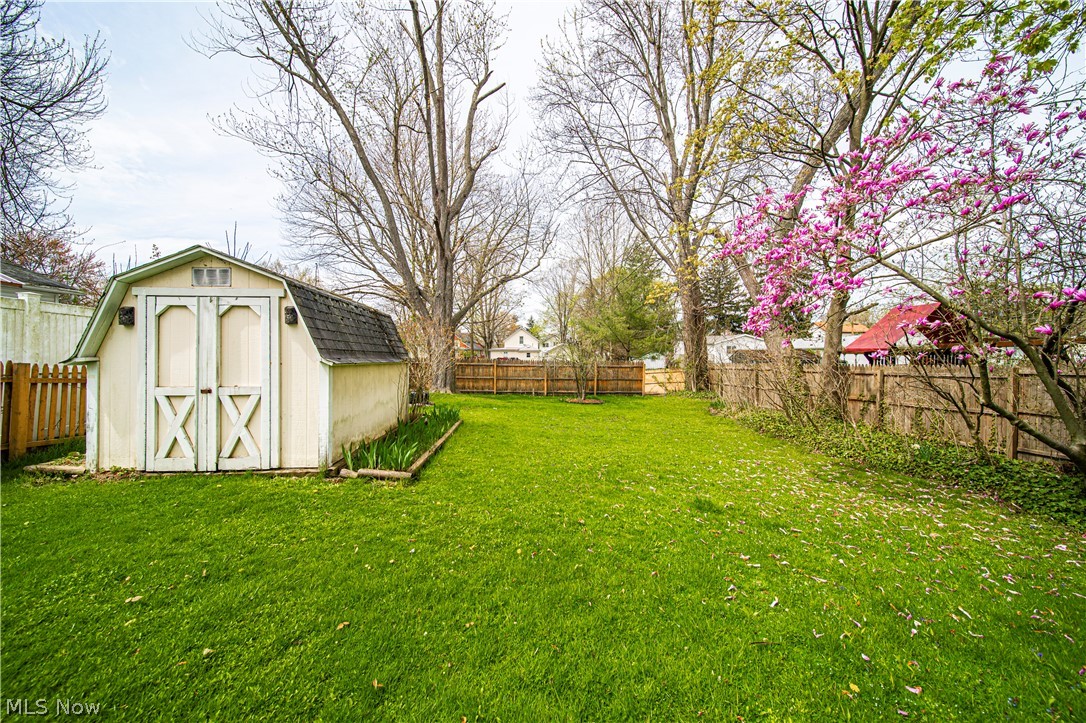 116 South Cedar Street Geneva, OH 44041 - Photo 31 of 35 View of yard with a shed