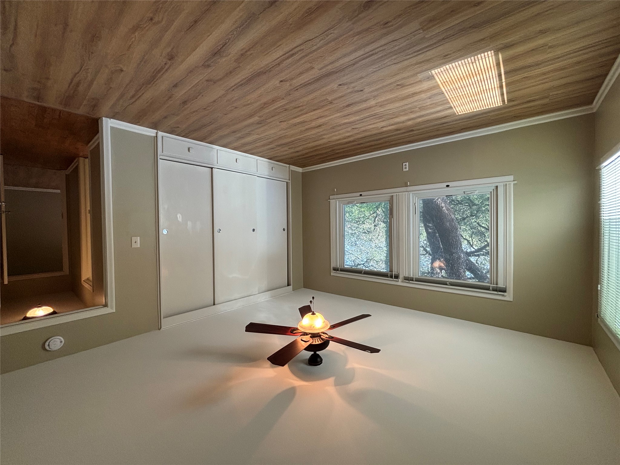 3509 River Road Austin, TX 78703 - Photo 19 of 40 Second bedroom, opposite view. Windows to back yard