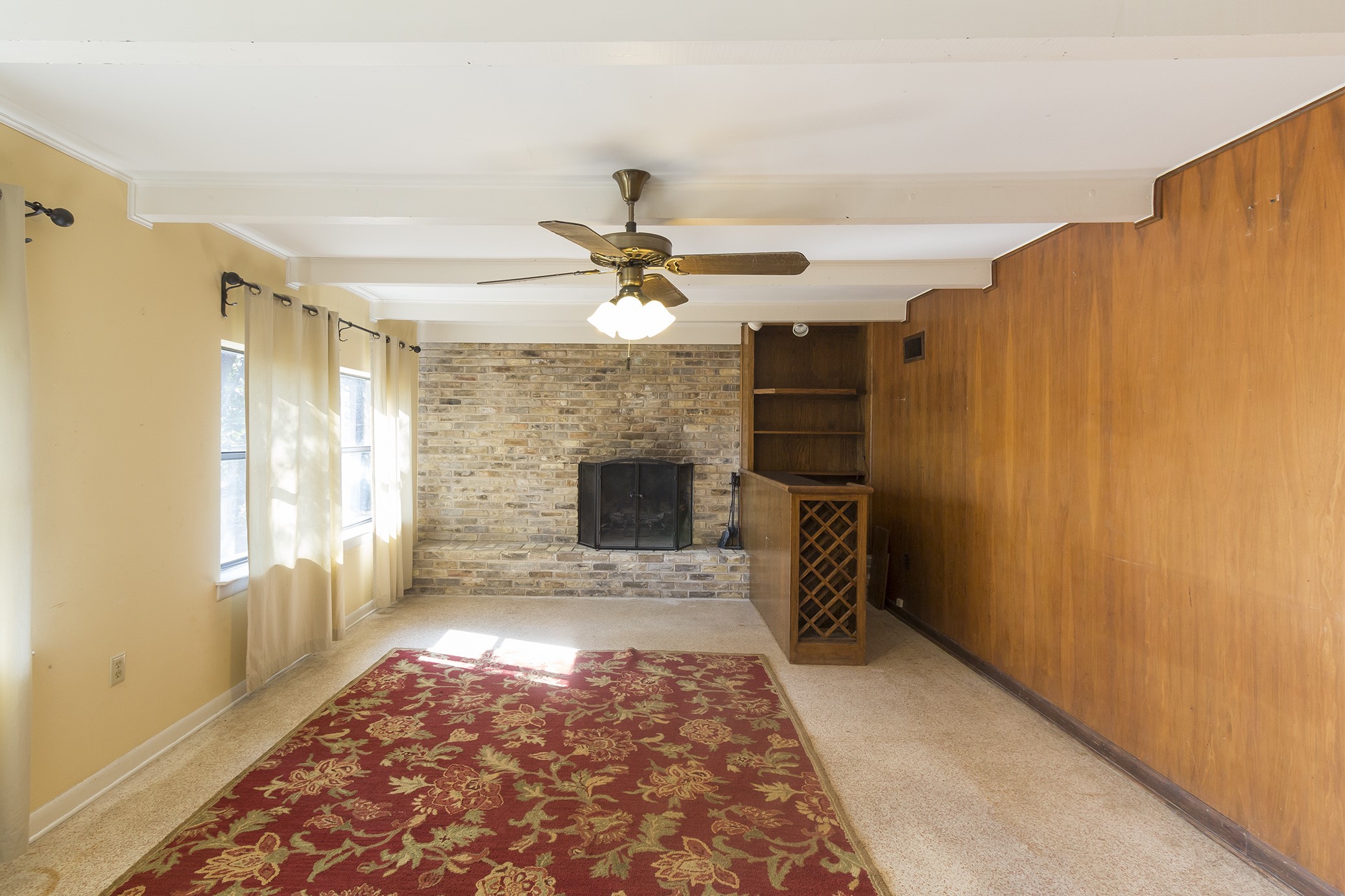 3509 River Road Austin, TX 78703 - Photo 31 of 40 Downstairs, bonus room. Often used as 3rd living area, office, man cave. This space accessed by going down outside stairs