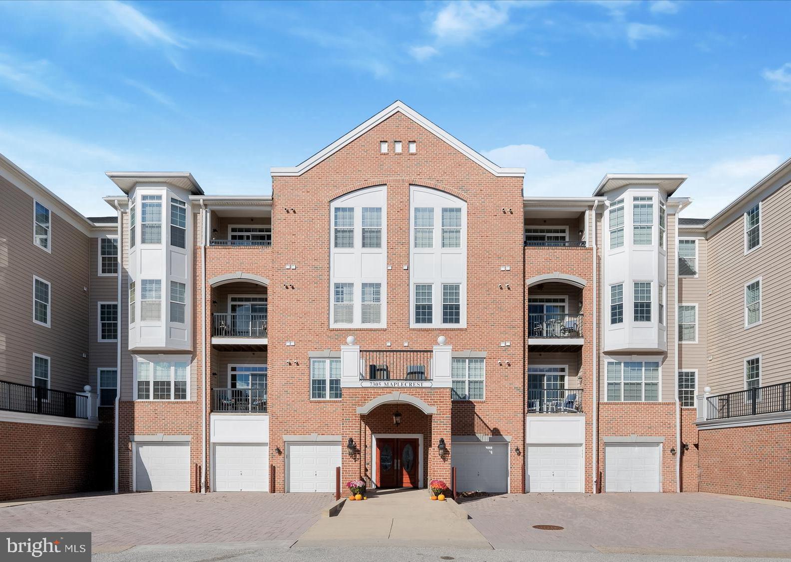 a front view of a building with a front door
