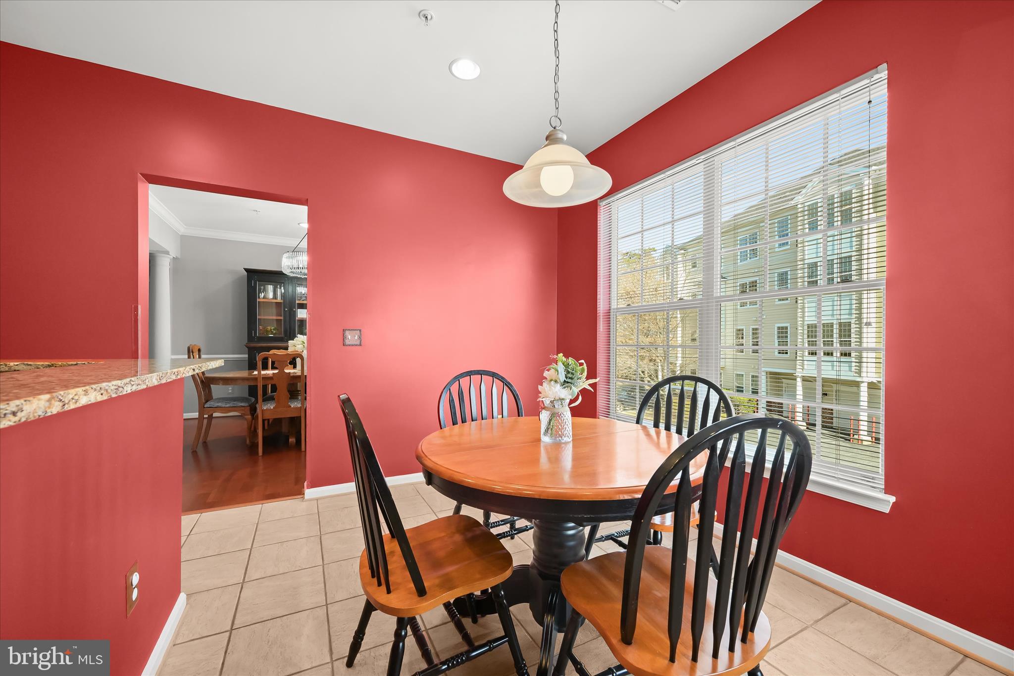 7305 Maplecrest Road, Unit 207 Elkridge, MD 21075 - Photo 15 of 50 a view of a dining room with furniture window and outside view