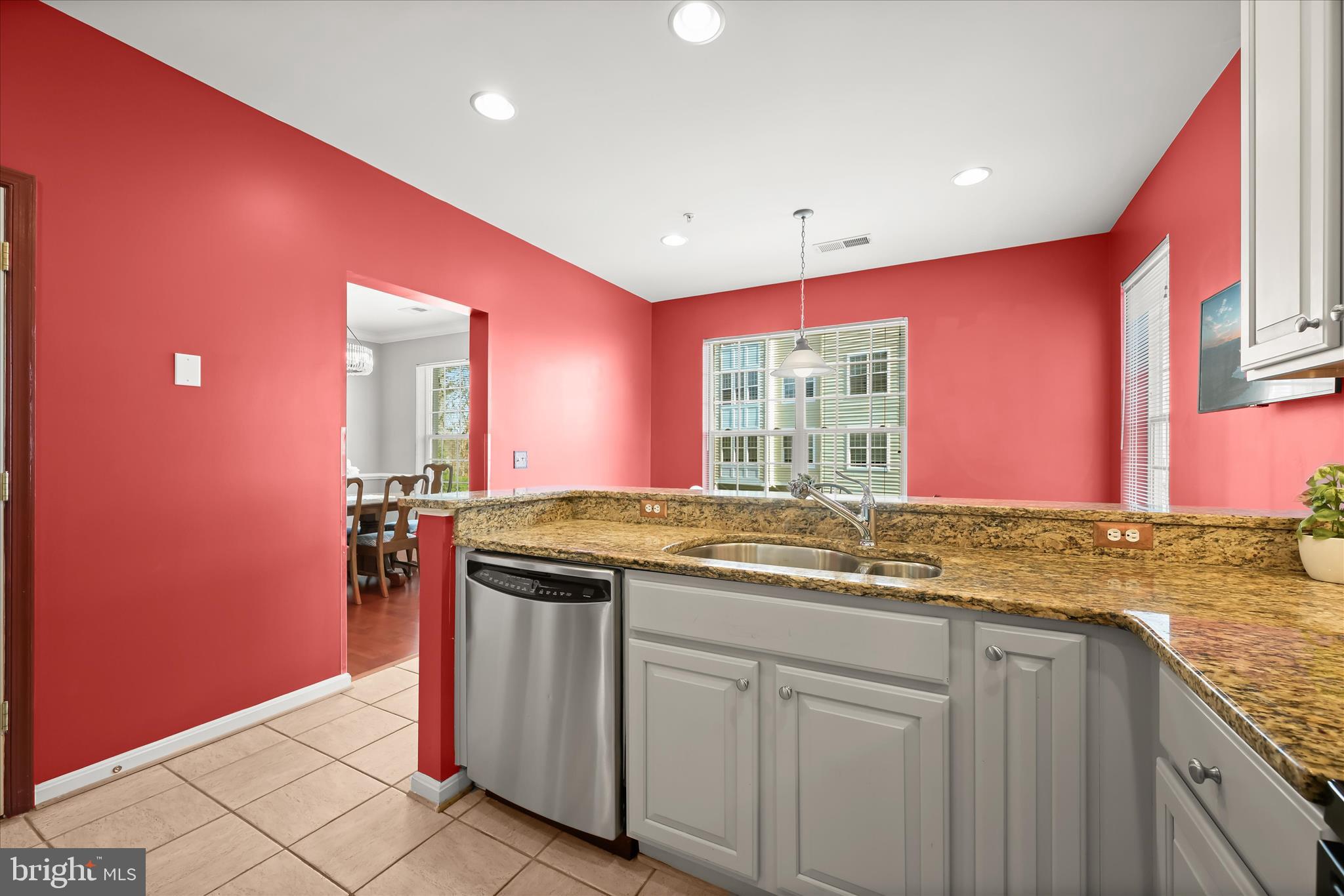 7305 Maplecrest Road, Unit 207 Elkridge, MD 21075 - Photo 18 of 50 a kitchen with granite countertop cabinets and window